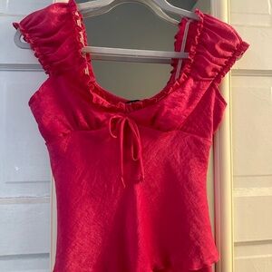 Originality silk pink top from Dillard’s